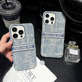 Tunde Store Christian Dior Denim-Inspired iPhone Case with Hand Strap
