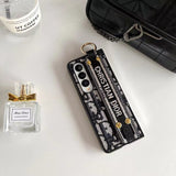 Tunde Store Christian Dior Samsung Z Flip/Z Fold Phone Case with Hand Strap â€“ Samsung Fold Models
