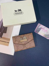 Tunde Store Coach Signature Card Holder Wallet with Horse and Carriage Logo